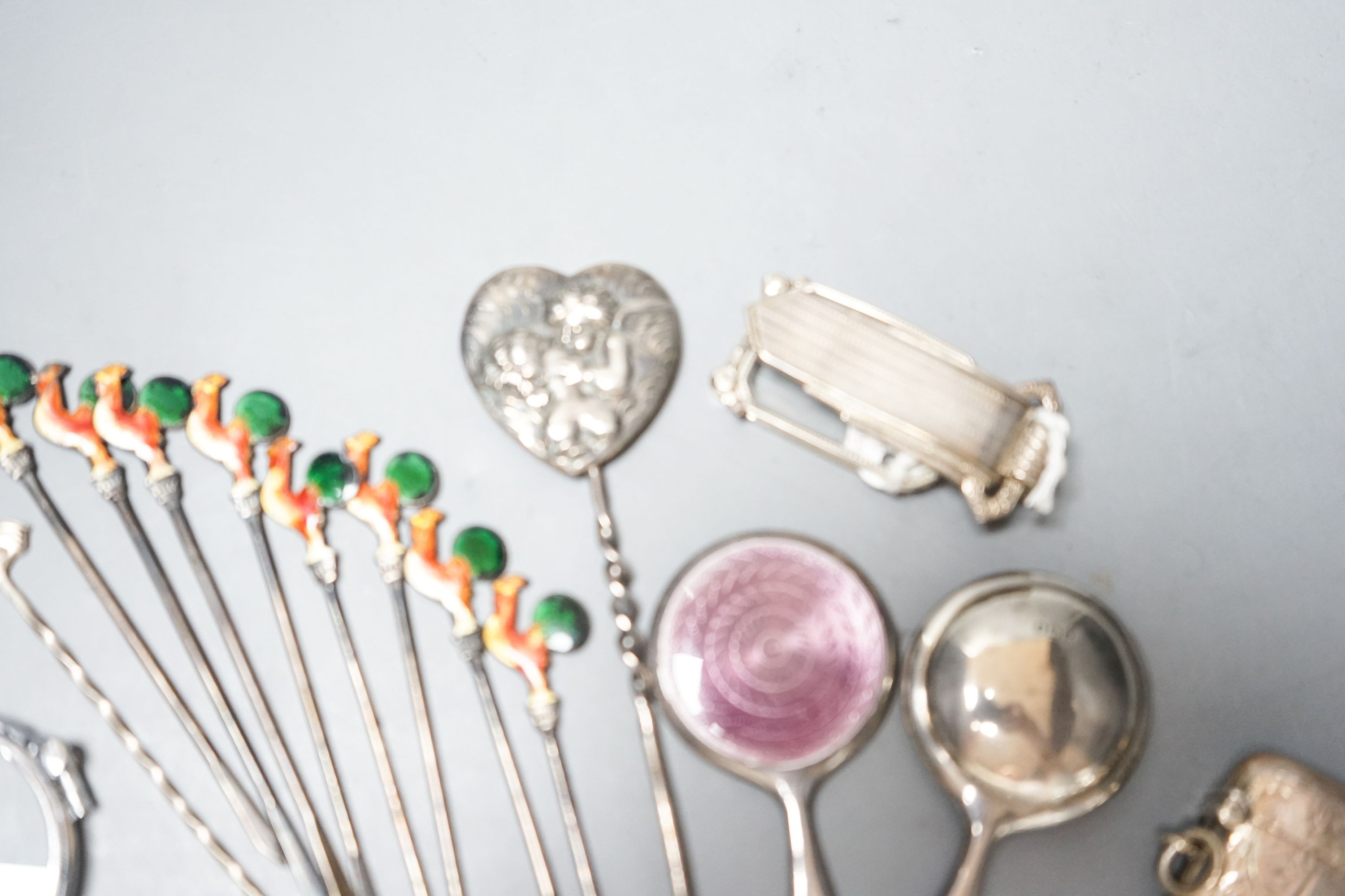 Small silver and white metal including enamelled handbag mirror and one other, a vesta case enamelled cocktail sticks, two metal lorgnettes etc.